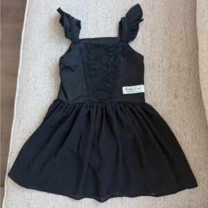 Bella and Omi black skirted Leo